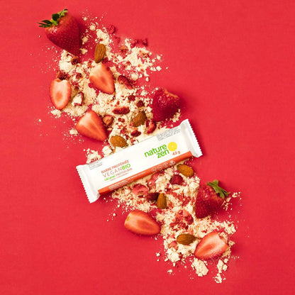 Nature Zen Organic Vegan Protein bars - Strawberry protein [New Recipe] bar and nuts - red background